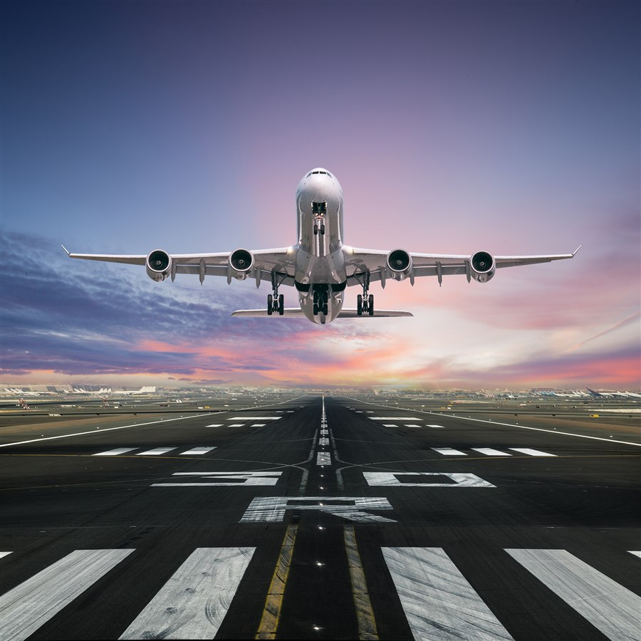 Passenger aircraft taking off from a runway